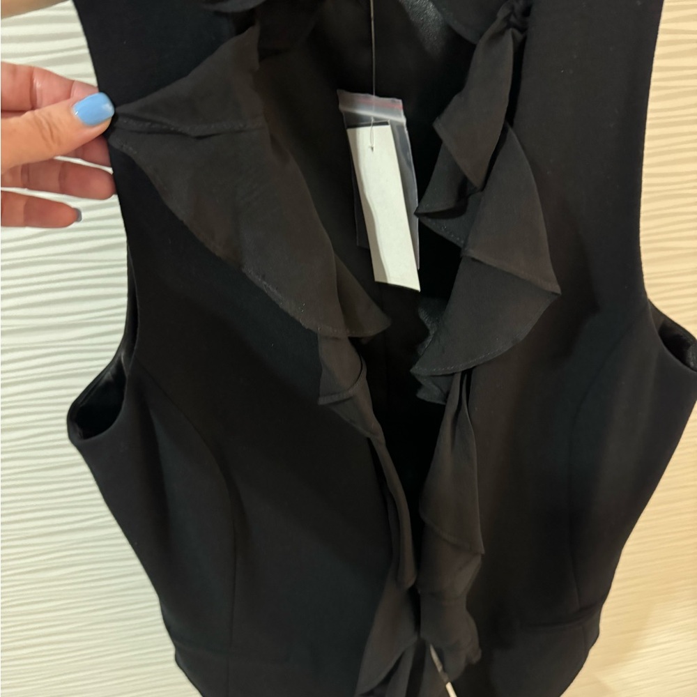 Gorgeous black vest brand new with detachable sheer black fabrics ruffle